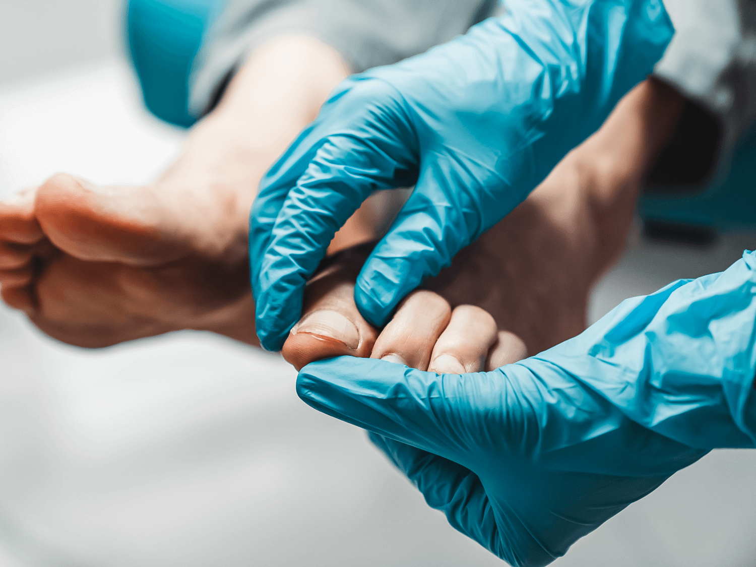 Podiatrist inspecting nails